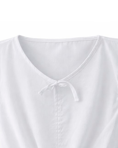 Blusa Blanca con Escote en V y Detalle de Lazo
