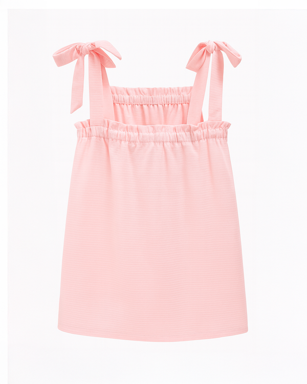 Blusa fresca rosa pastel con moños ajustables