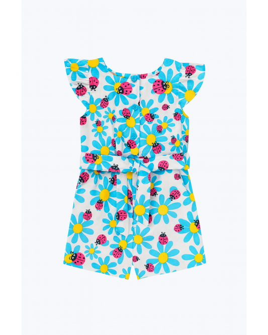 Enterizo blanco con estampado de flores y mariquitas
