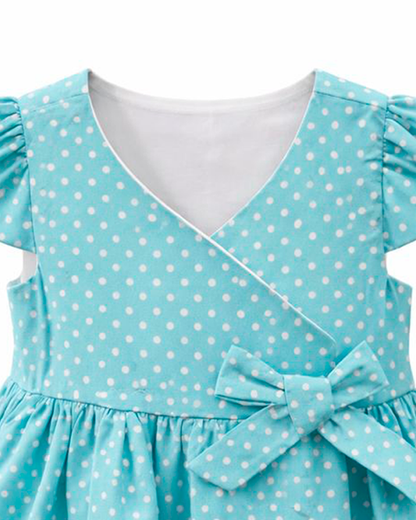 Vestido Turquesa de Puntos con Lazo Decorativo