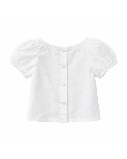 Blusa Niña Blanca con Moño Frontal Rosado