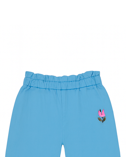 PANTALON BOLSILLO PARCHE NIÑA CELESTE