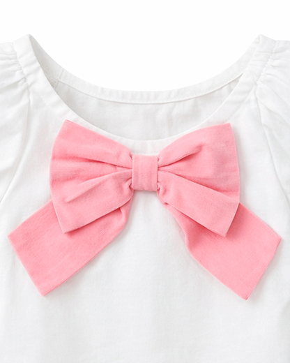 Blusa Niña Blanca con Moño Frontal Rosado